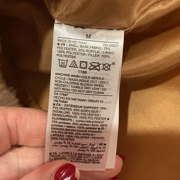 Old Navy women’s vest, size medium, ivory fur with brown detail,keeps u warm! - Picture 9 of 9